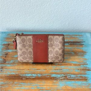 Coach Monogram Canvas Wristlet with Rust Leather Trim